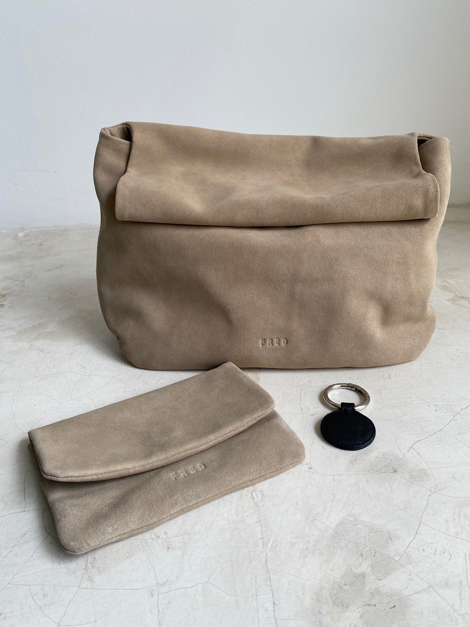 SUEDE CLUTCH in SAND